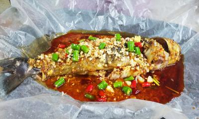  成都特色餐飲培訓(xùn)學校，哪里可以學正宗紙包魚技術(shù)培訓(xùn)？